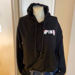 black hoodie from pink